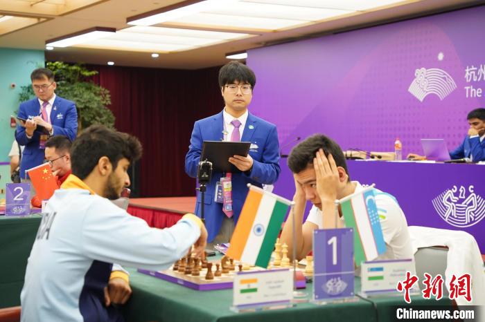 表姐弟重逢共执裁杭州亚运会国际象棋赛事